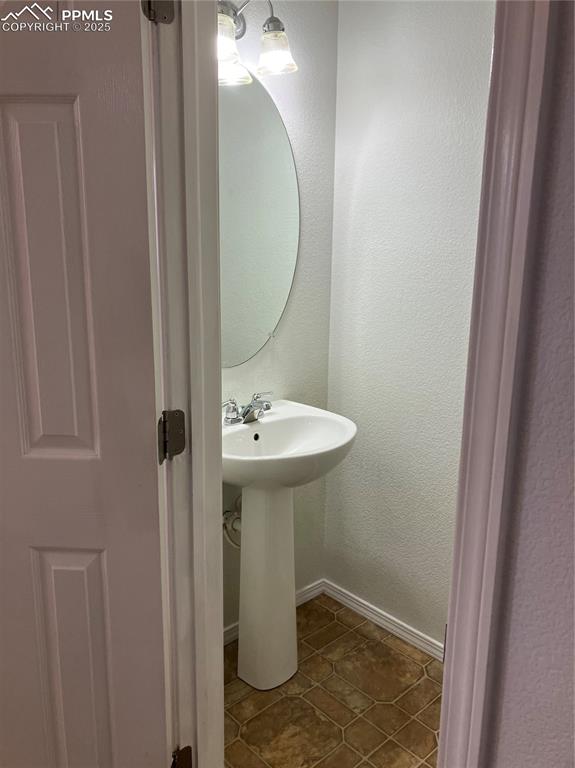 Image 8 of 18: Half bath on main level
