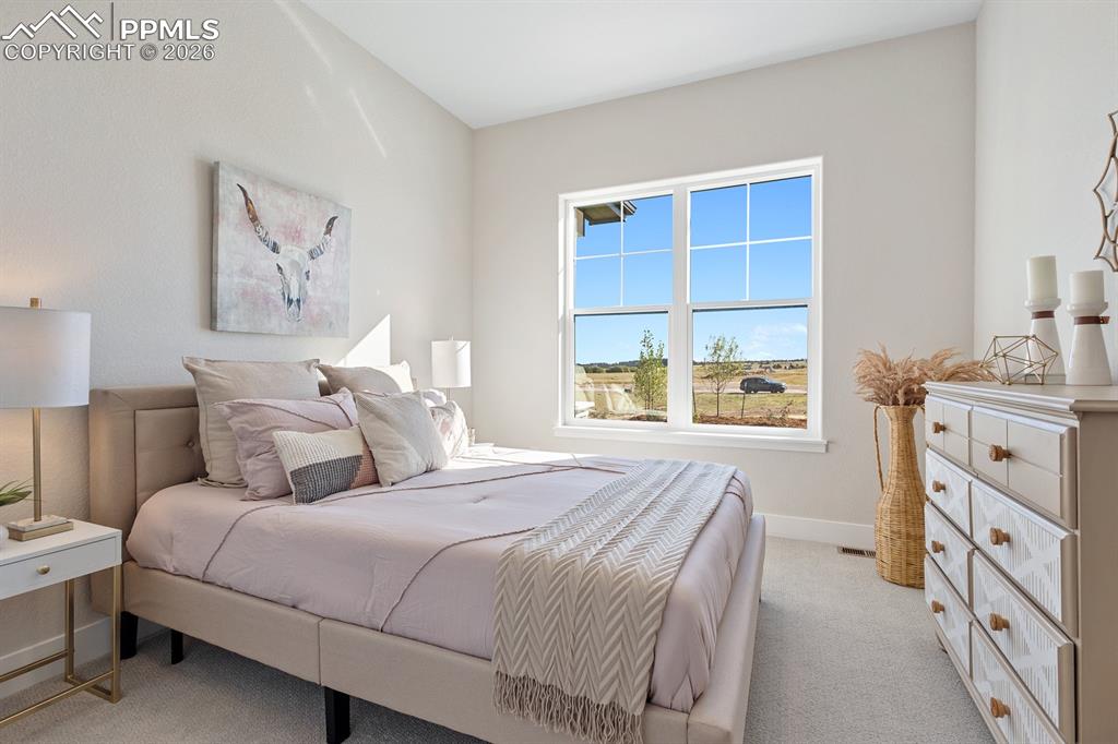 Image 19 of 35: Main level bedroom