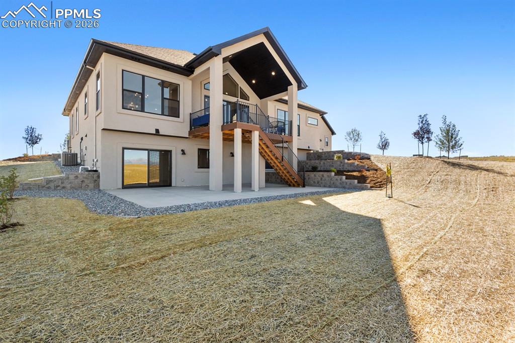 Image 5 of 35: Rear Elevation with covered deck