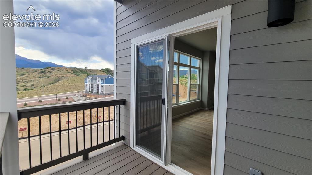 Image 11 of 32: Composite Deck off the Living Room!