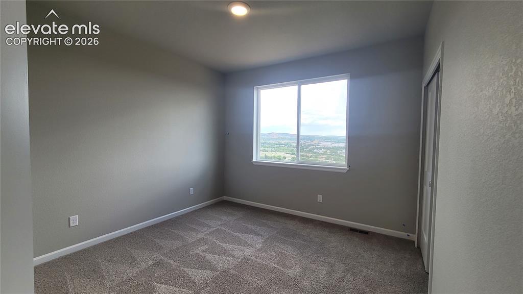 Image 18 of 32: 2nd Bedroom, located on the upper level!