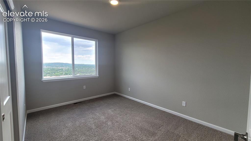 Image 20 of 32: 3rd Bedroom, located on the upper level!