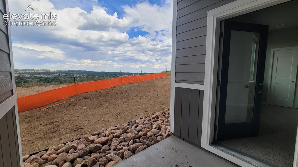 Image 8 of 32: Private Patio yielding views to the East, connected to the Junior Suite!
