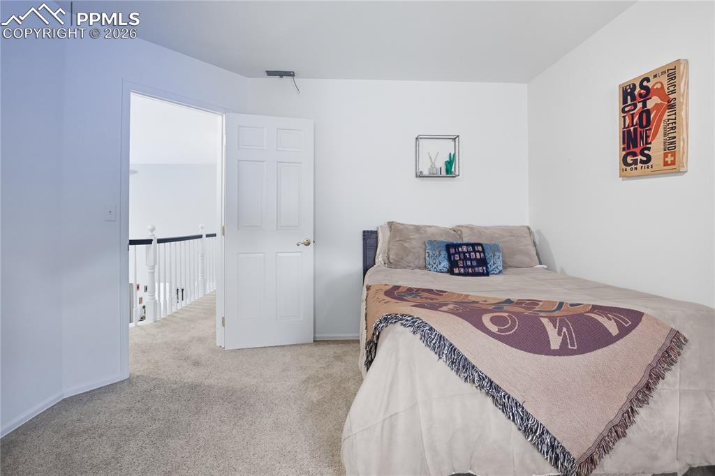 Image 37 of 45: View of carpeted bedroom