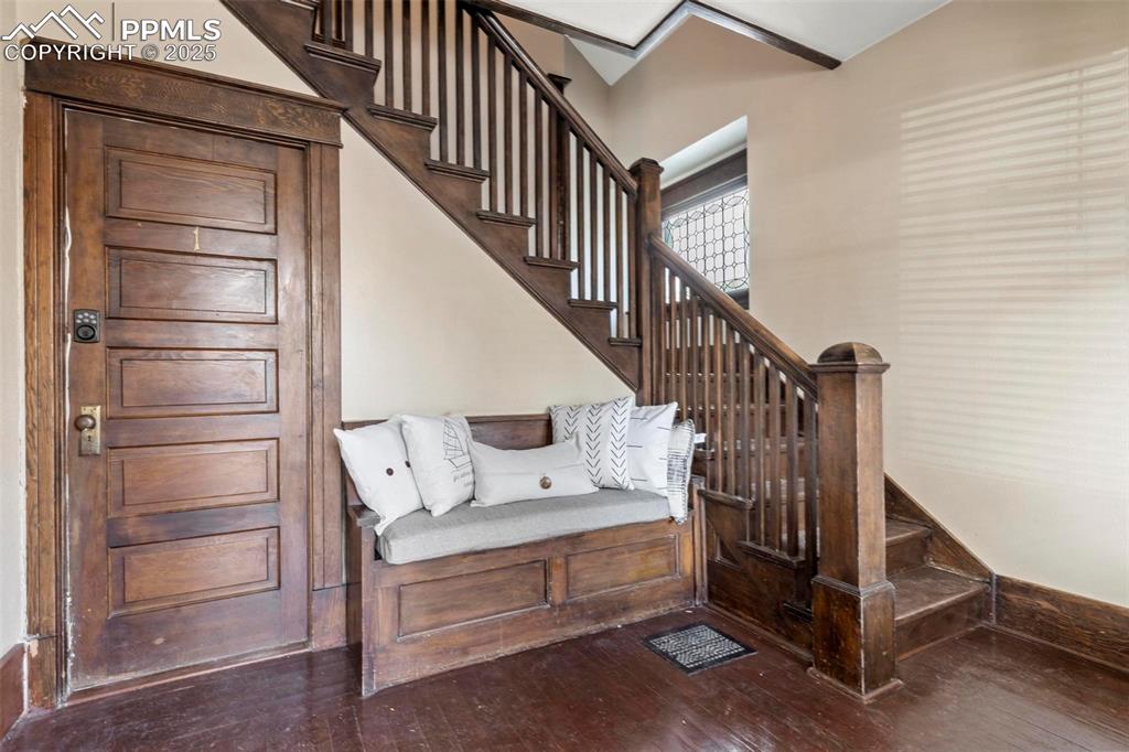Image 17 of 43: Stairway with wood-type flooring