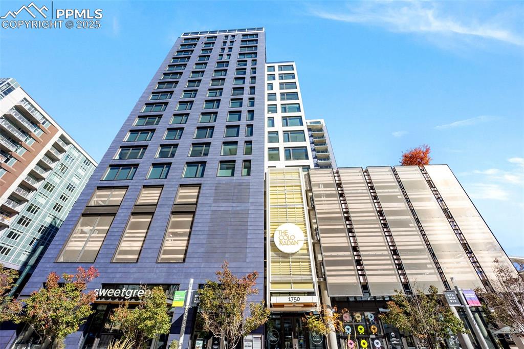 Caption: View of building exterior, Luxury High Rise