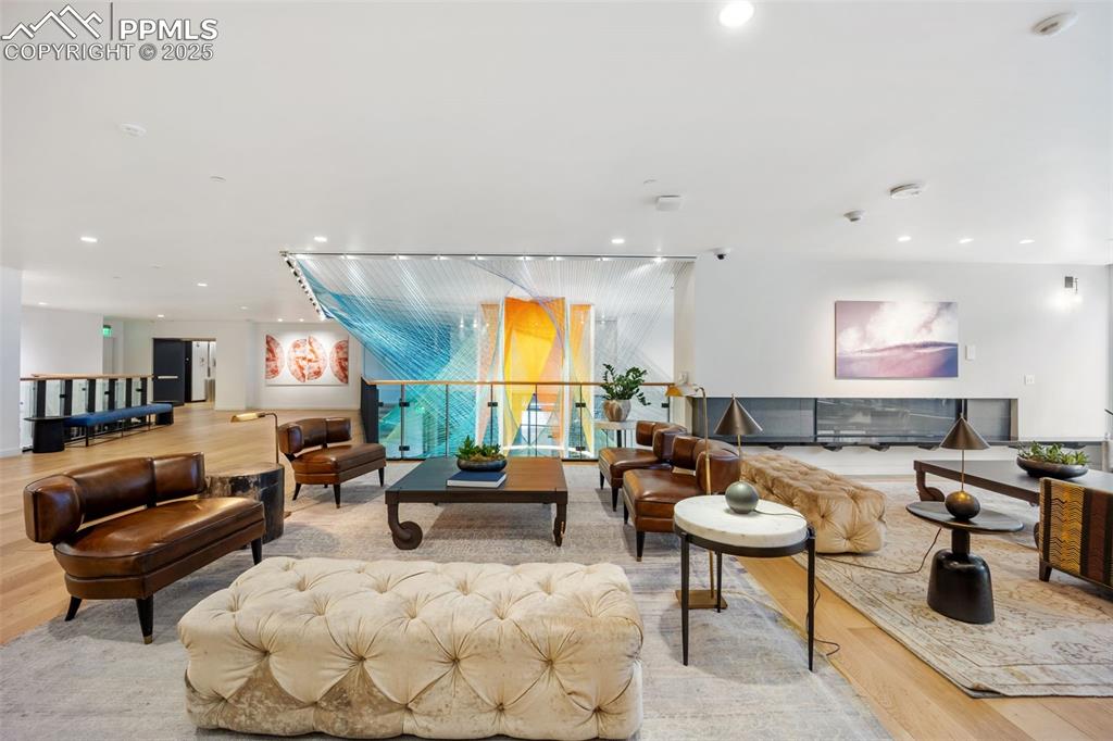 Image 17 of 50: Common area featuring art lighting fixture