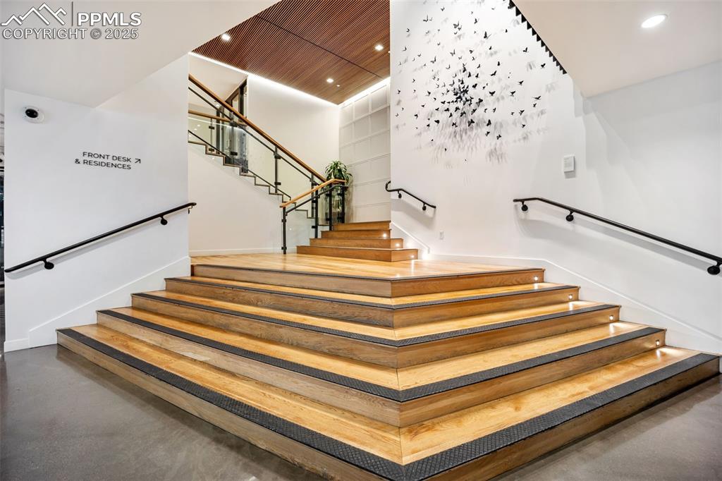 Image 2 of 50: Grand staircase leading to the residence lobby