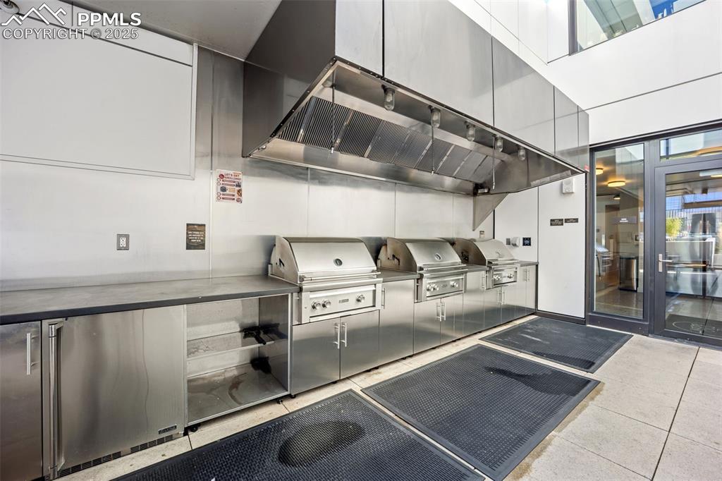 Image 45 of 50: View of patio / terrace featuring an outdoor kitchen