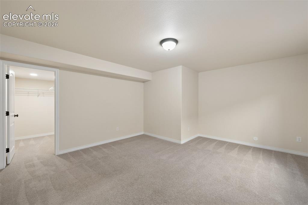 Image 32 of 39: Basement Bedroom 4
