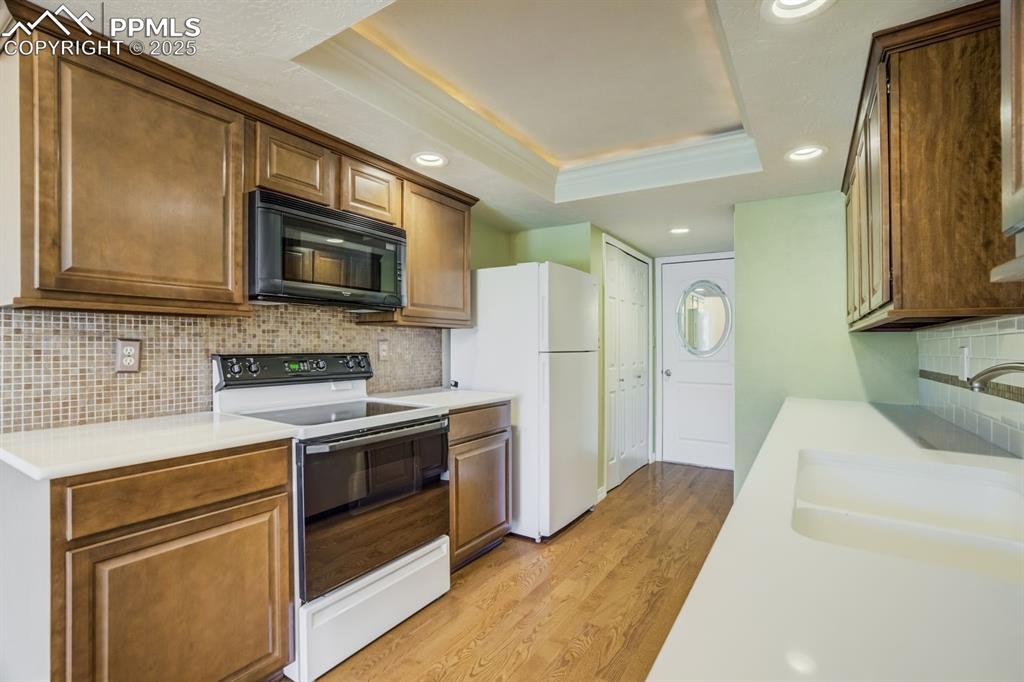 Image 15 of 41: New cabinetry line the kitchen.