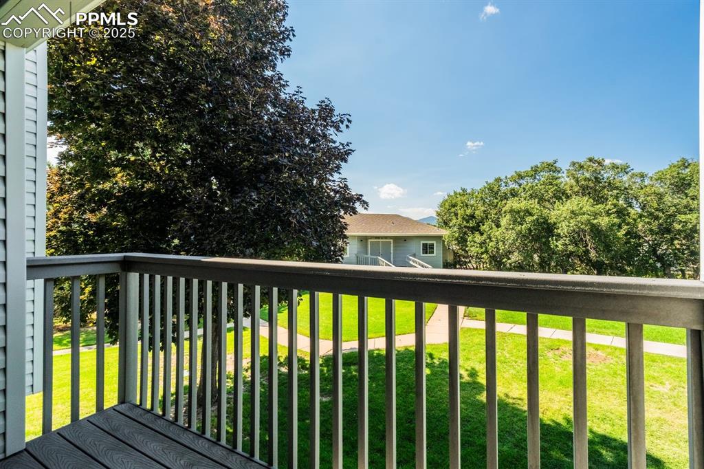 Image 18 of 41: Walk out deck off dining room.