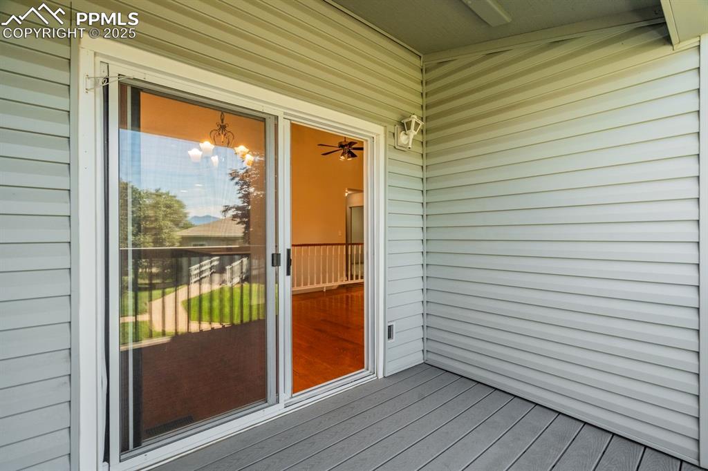 Image 19 of 41: Covered deck ready for taking in those views.