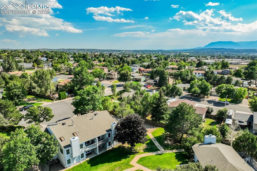 Image 41 of 41: Aerial perspective of suburban area with mountain views.