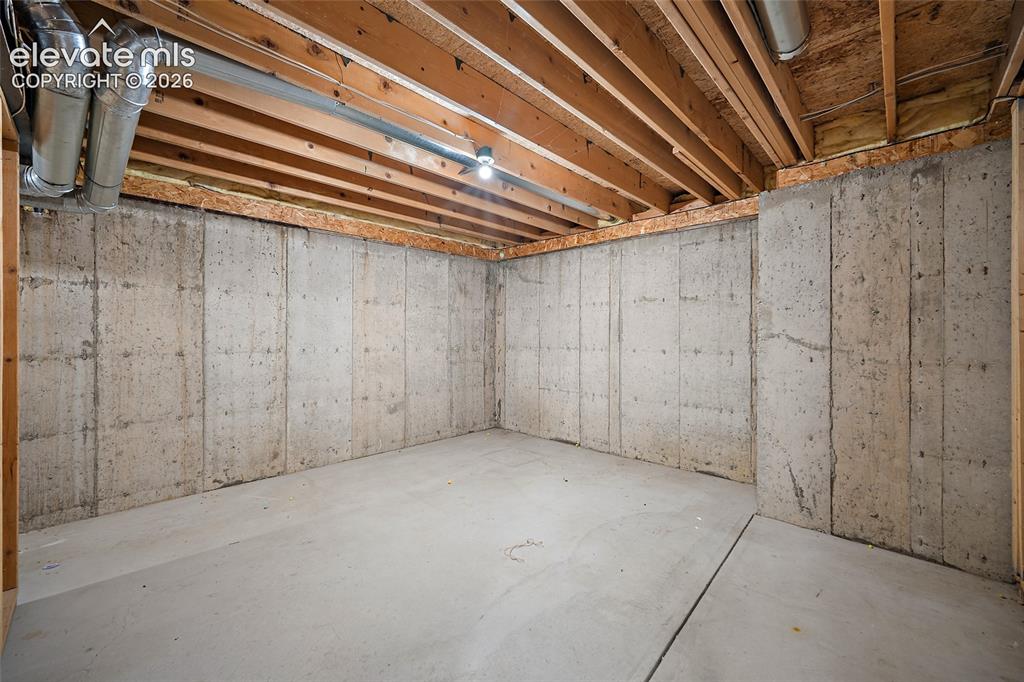 Image 36 of 43: Unfinished area for storage