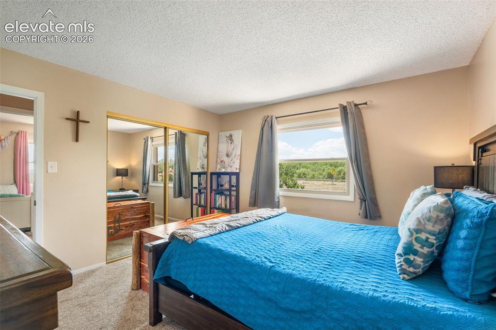 Image 12 of 49: Bedroom