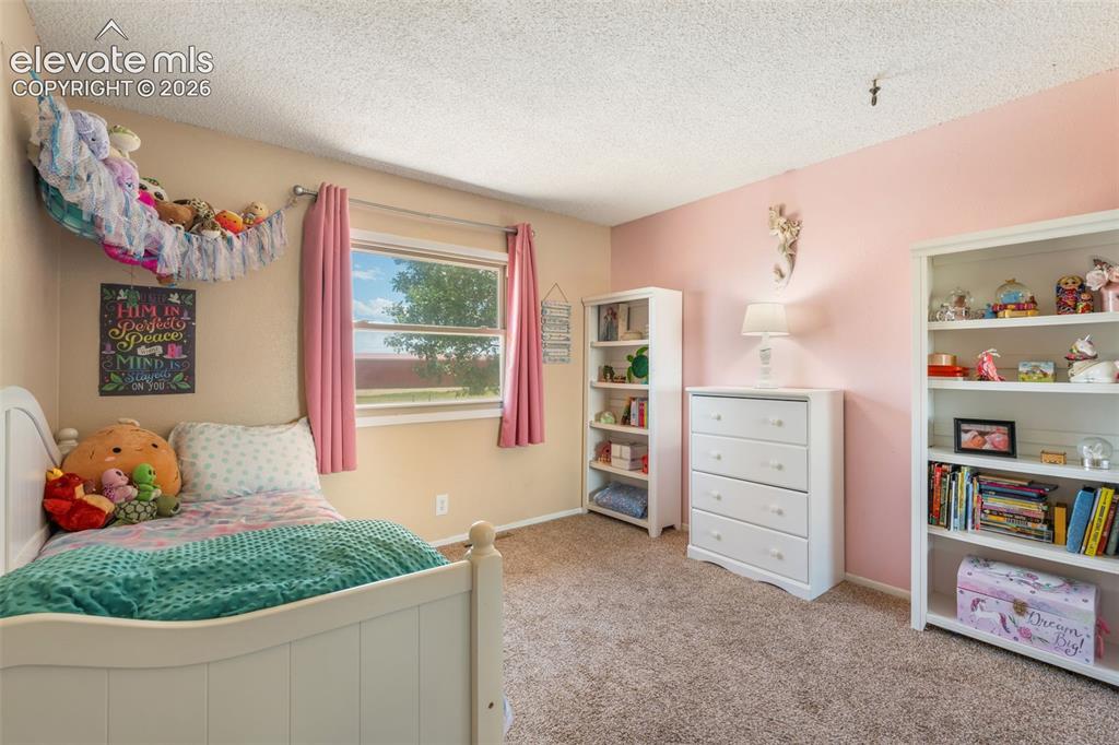 Image 14 of 49: Bedroom