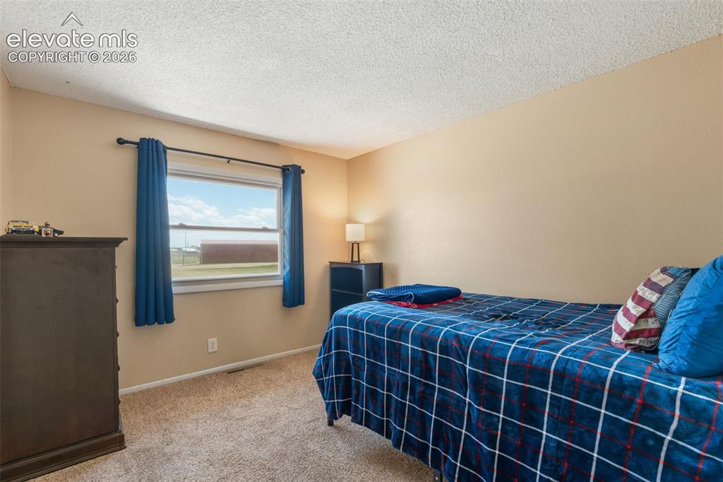 Image 16 of 49: Bedroom