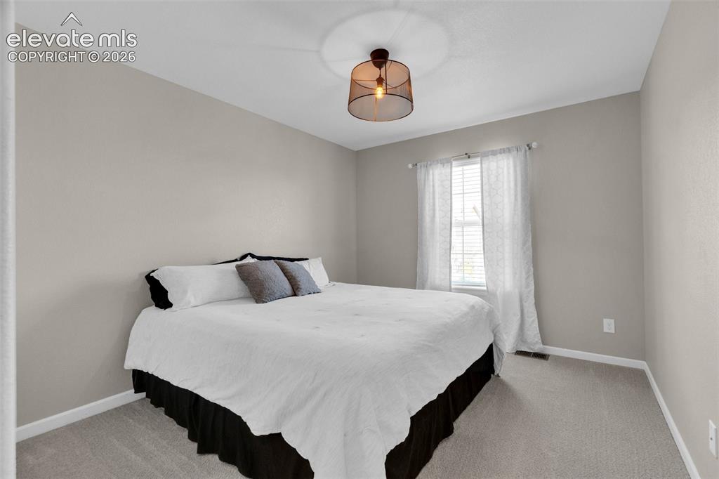 Image 33 of 48: Bedroom