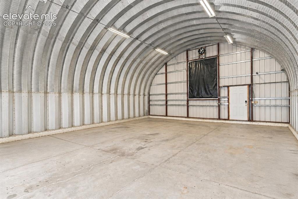 Image 34 of 43: Detached boat garage 