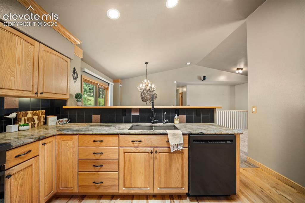 Image 11 of 30: Main level entrance into the living room