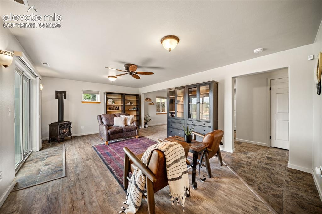 Image 19 of 30: Main level kitchen with granite counterops, stainless steel applainces and