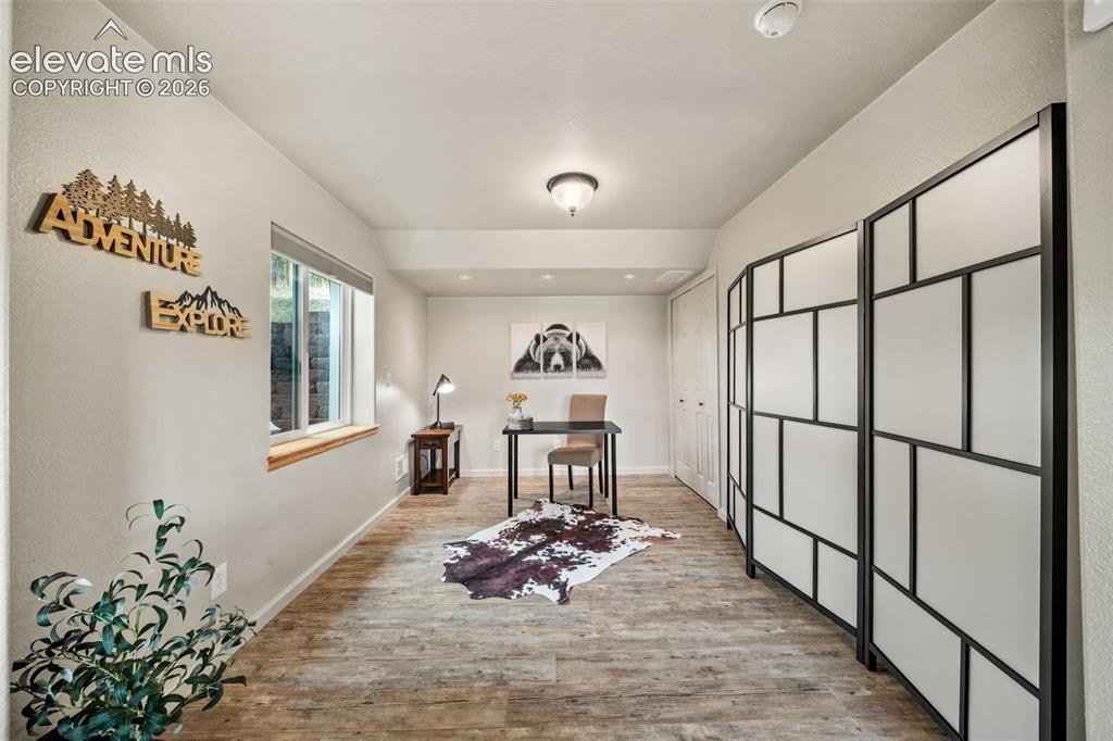 Image 21 of 30: Main level kitchen with view into the dining area