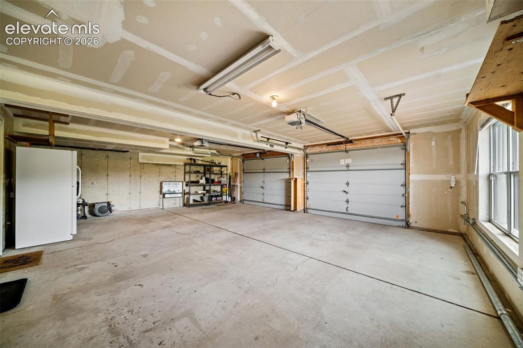 Image 23 of 30: Main level bedroom with ensuite