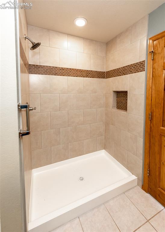 Image 29 of 48: New custom tiled stand alone shower.