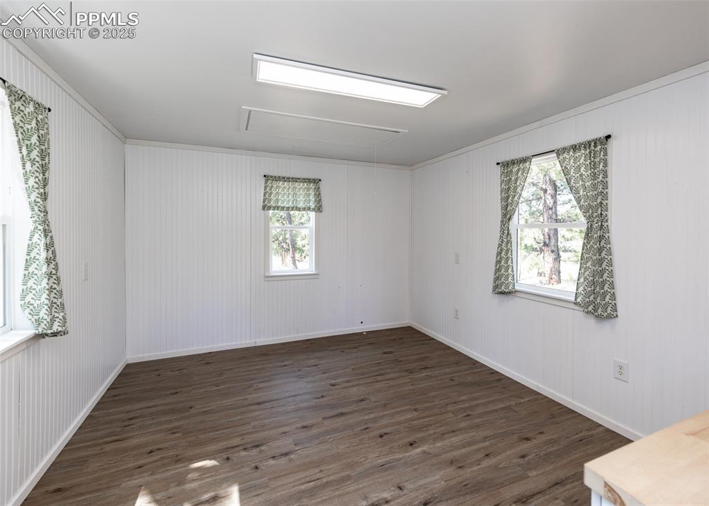 Image 43 of 48: Another view inside the cottage. Lots of light!