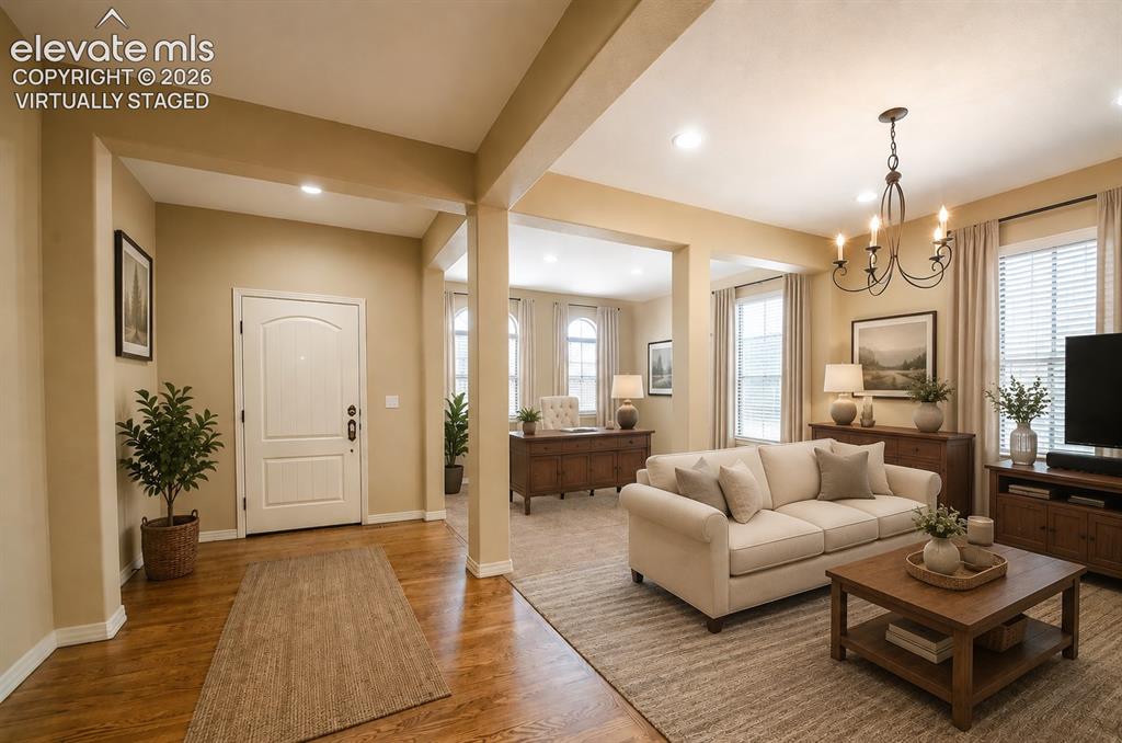Image 12 of 48: front room virtually staged