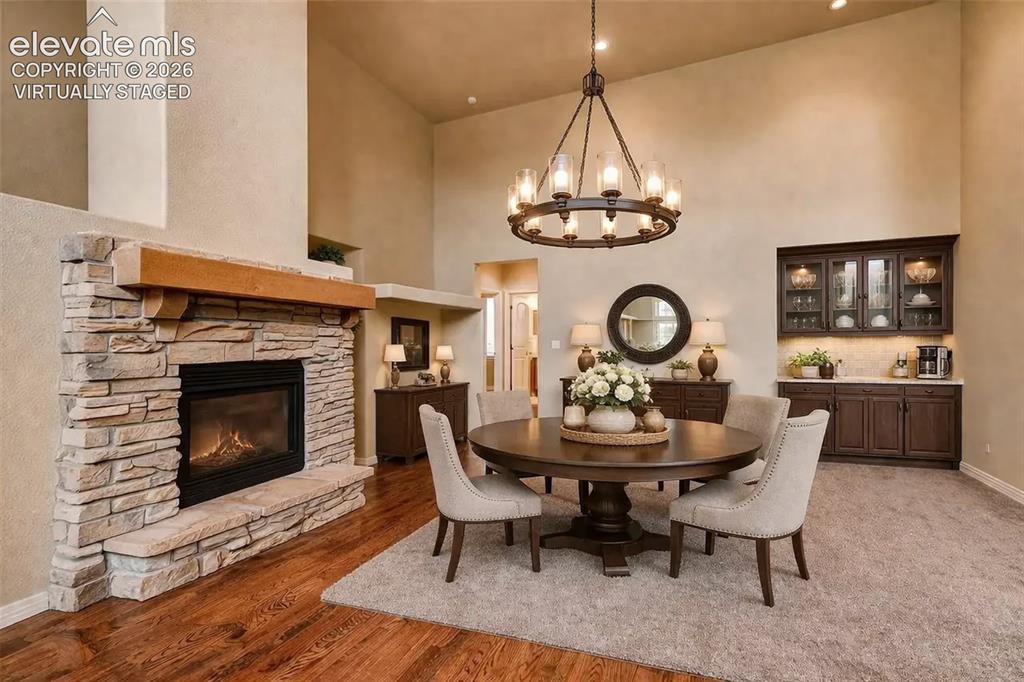 Image 48 of 50: virtually staged dining area