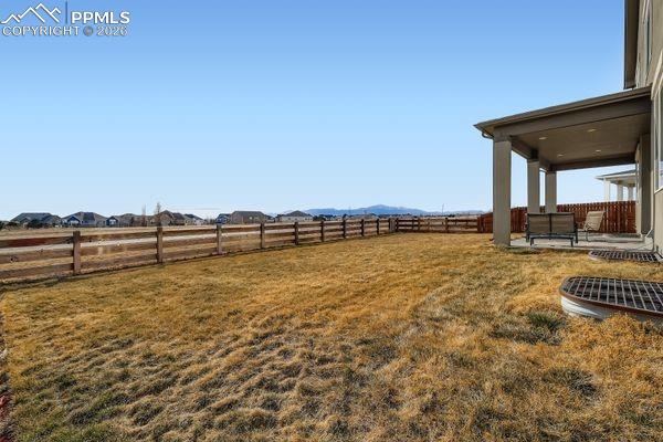Image 35 of 35: Fenced backyard featuring a patio and a view of countryside