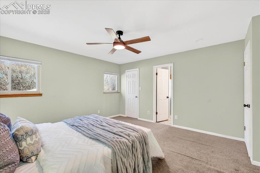 Image 26 of 49: Bedroom featuring carpet flooring and a ceiling fan