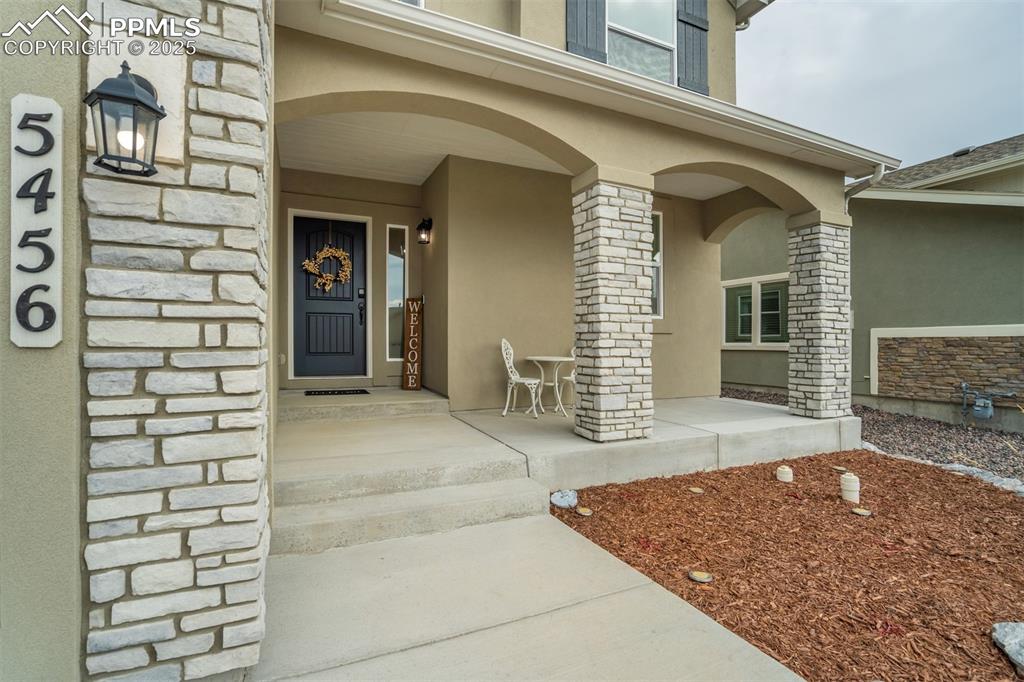 Image 2 of 49: Inviting front porch