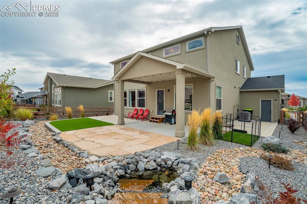 Image 40 of 49: Thoughtful landscaping to be enjoyed year round!