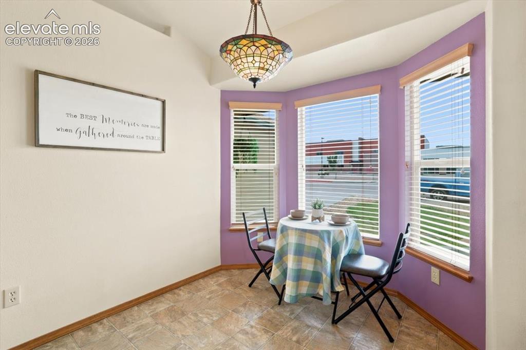 Image 10 of 50: Bay window in the kitchen allows for a breakfast nook