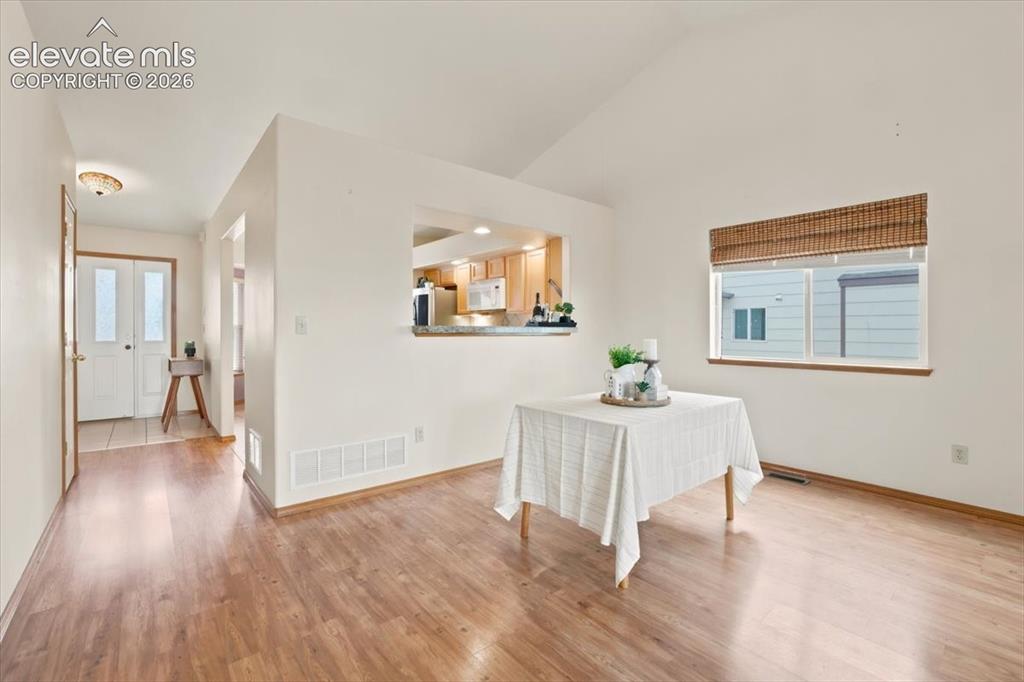 Image 13 of 50: Ample space for a large table for gathering of family and friends