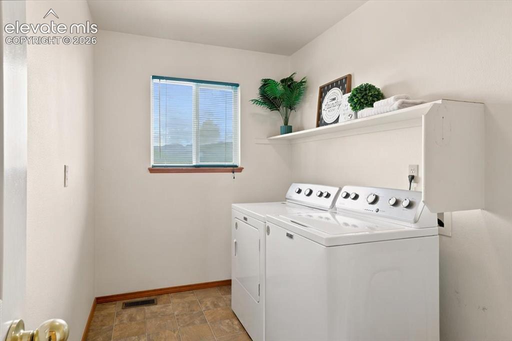 Image 17 of 50: Laundry is on the main floor