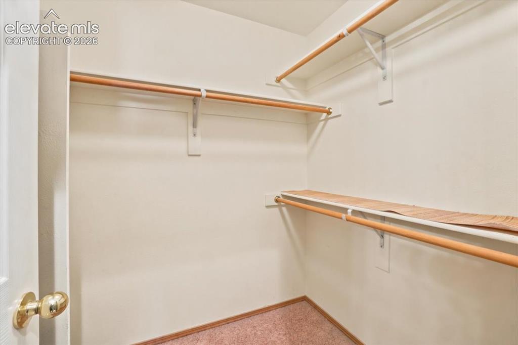 Image 28 of 50: Large closet in the primary bedroom