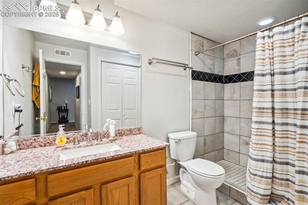 Image 28 of 31: Basement bathroom