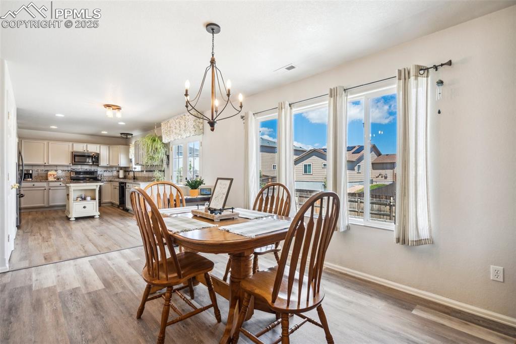 Image 9 of 31: View from the living room facing the kitchen