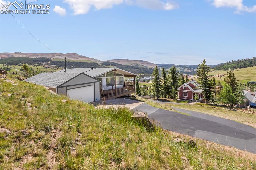 Image 37 of 38: Views surround this home. Eastern sunrise views and amazing sunsets to the