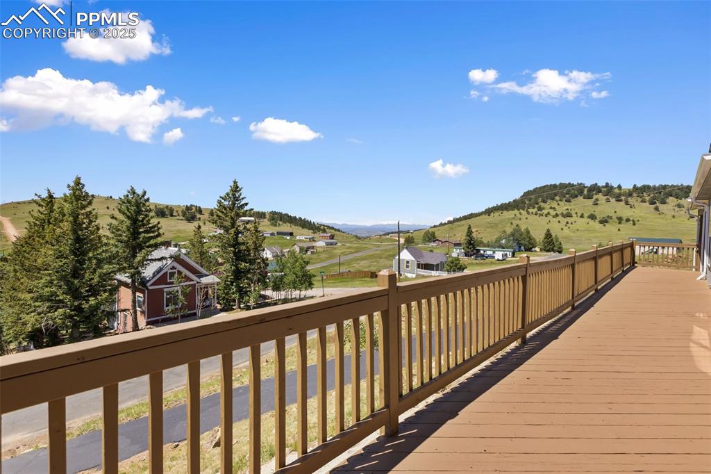 Image 6 of 38: Mountain views and green hillsides await you at your new home.