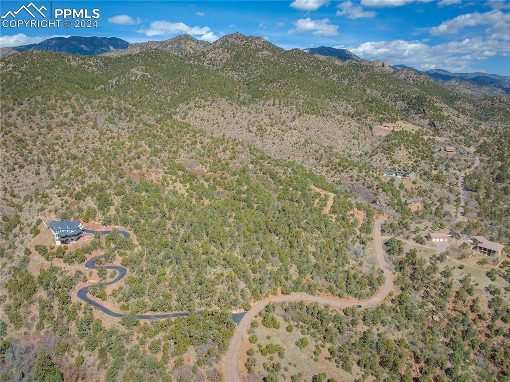 Image 10 of 21: Driveway graded to lower build site