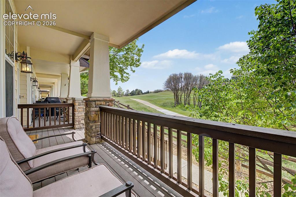 Image 24 of 33: A versatile third bedroom features vaulted ceilings, a large picture window