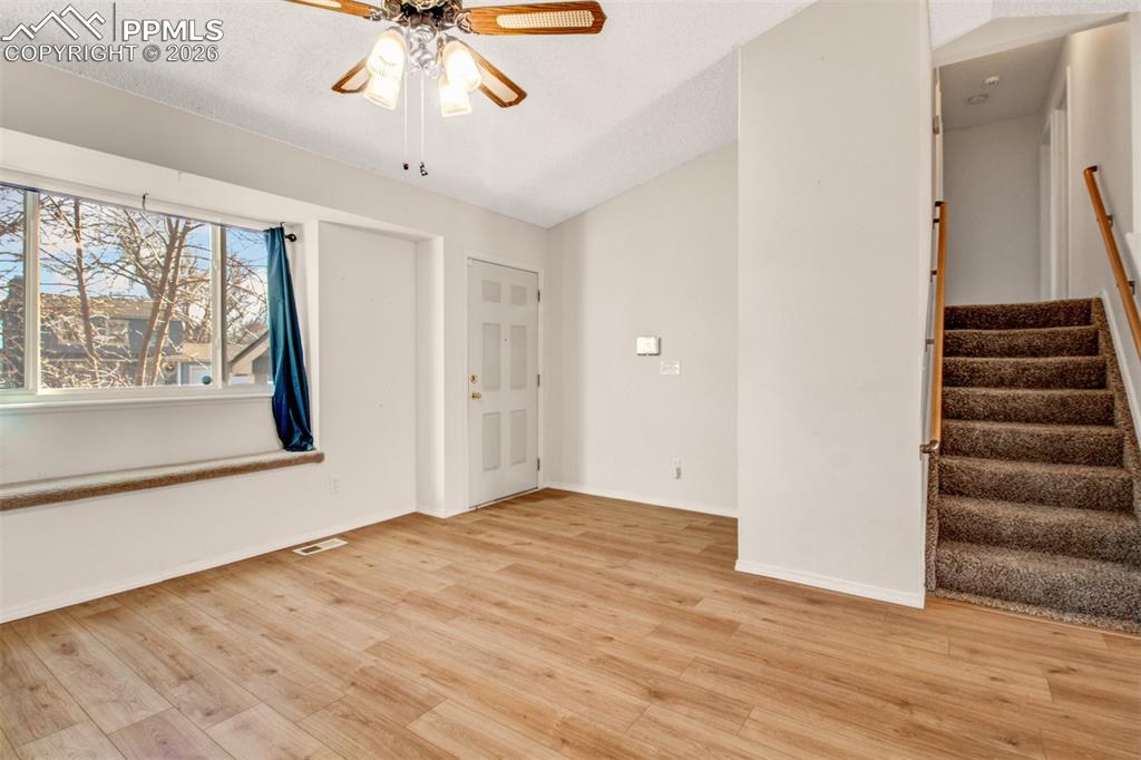 Image 2 of 35: Luxury vinyl flooring throughout main level