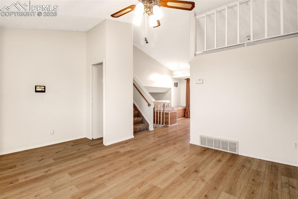 Image 3 of 35: Vaulted ceilings and front entry closet