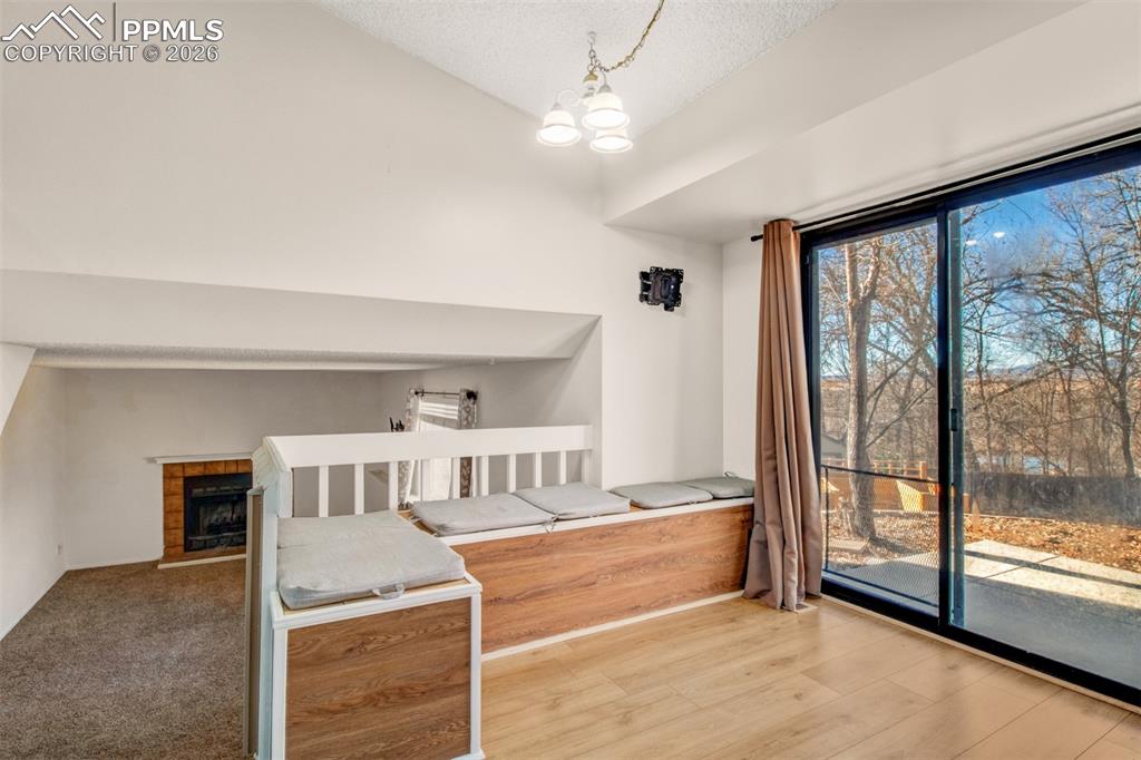 Image 9 of 35: Dining area with built in seating and walk out access