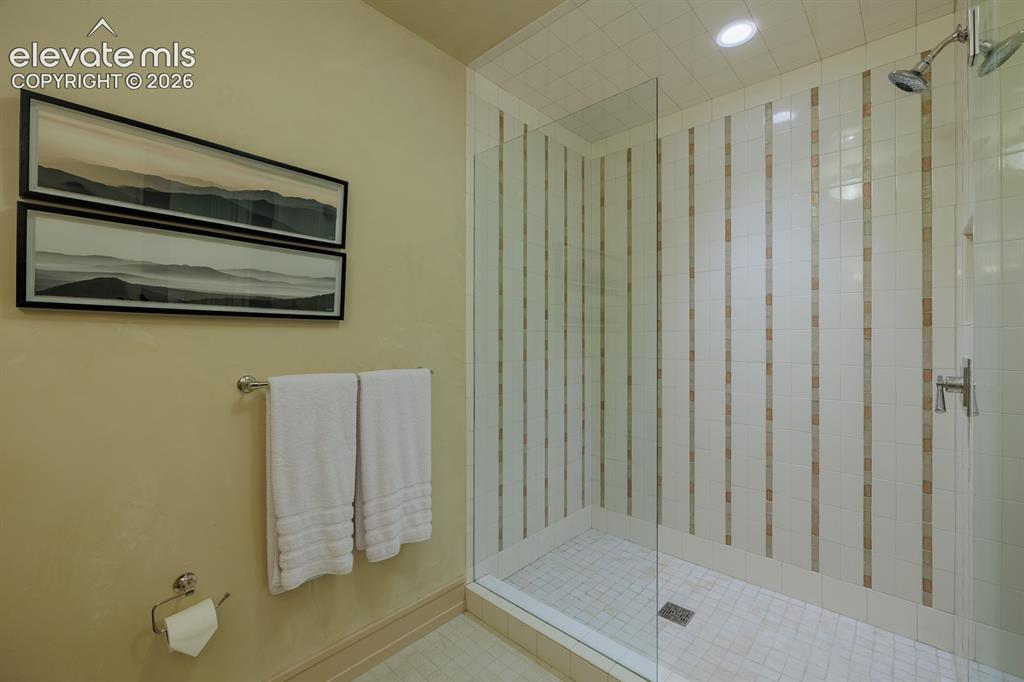 Image 18 of 49: One of three bedroom suites leading to a terrace connecting all three